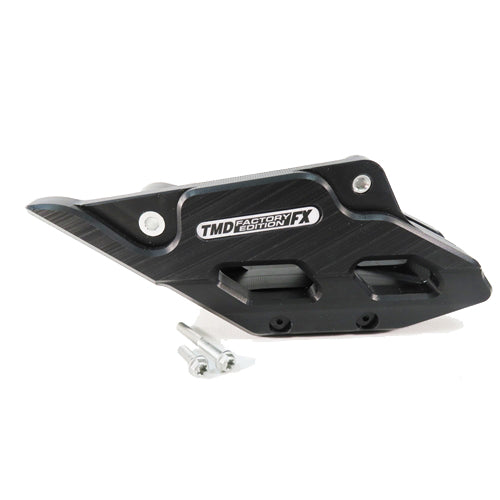 "Guía de cadena TM Designworks RCG-KT5-BK negra instalada en Husqvarna TE 2024"

"Protector cadena irrompible enduro TM Designworks Factory FX negra KTM"

"Upgrade basculante evitar salida cadena guia plastica negra TMD GasGas 2025"